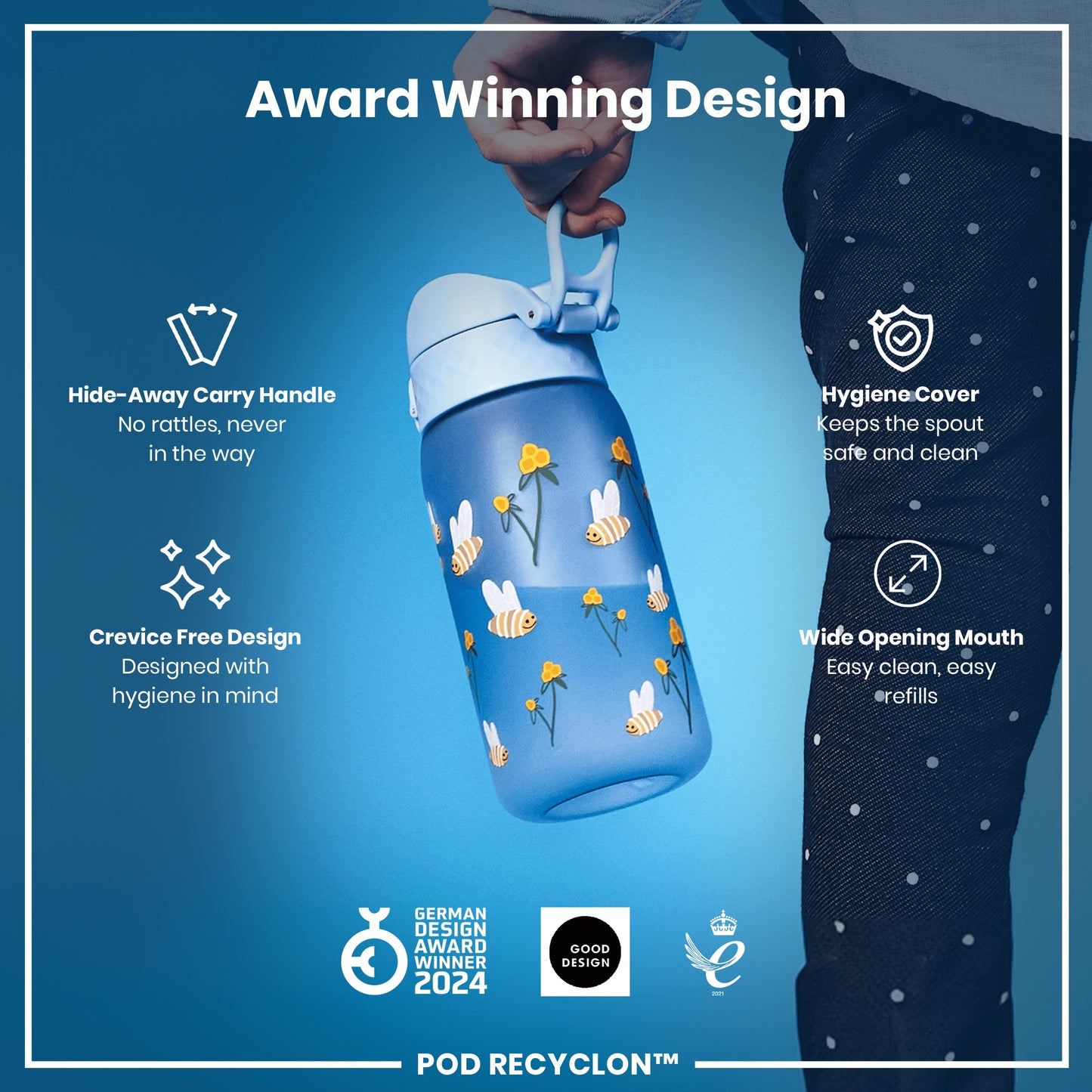 A blue water bottle, with bees and flowers, is being held. Features include a hide-away handle, hygiene cover, and wide mouth. It's an award-winning design.