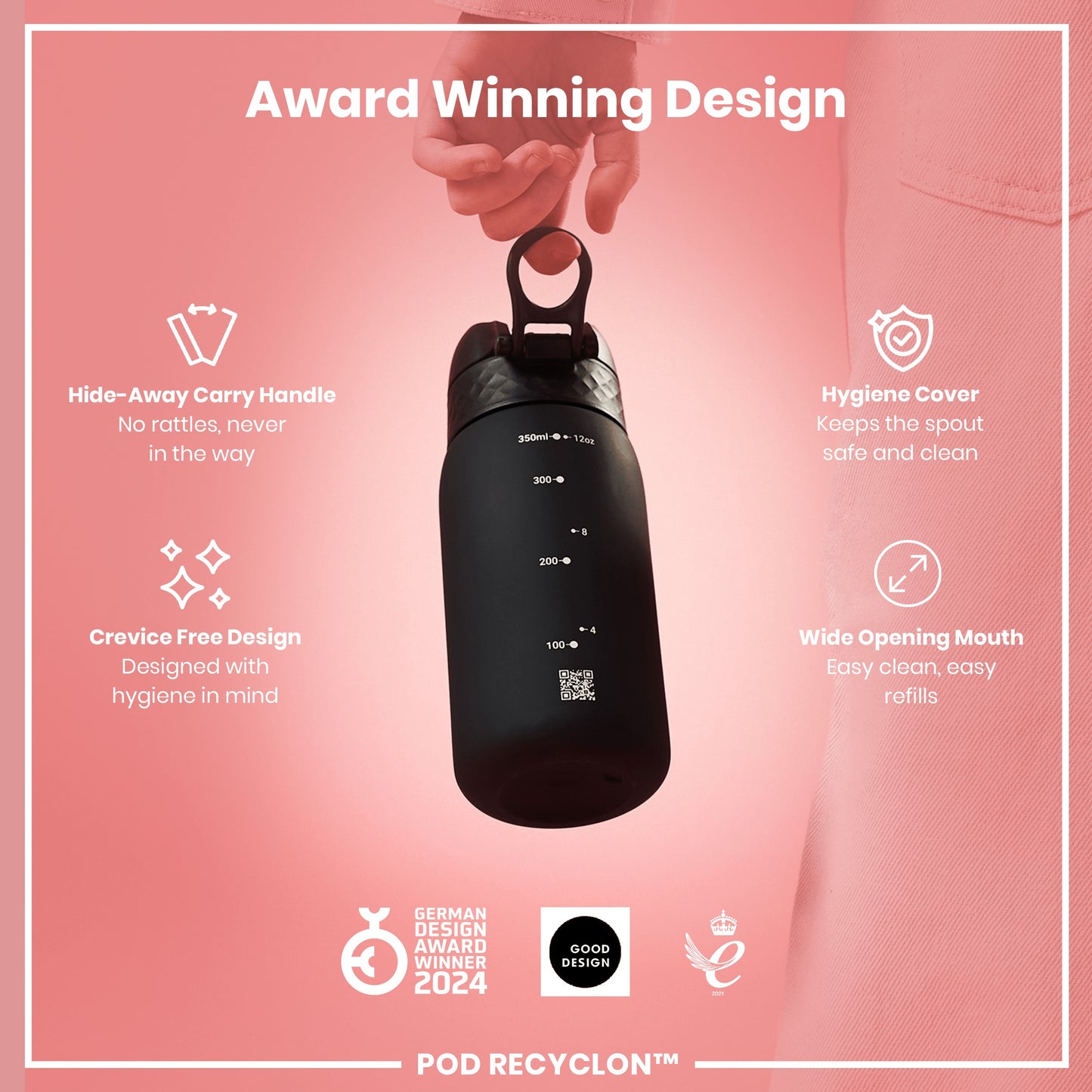 A black water bottle with a carrying handle is being held. The bottle features measurement markings and a QR code. It's shown against a pink background with text highlighting its design features and awards.