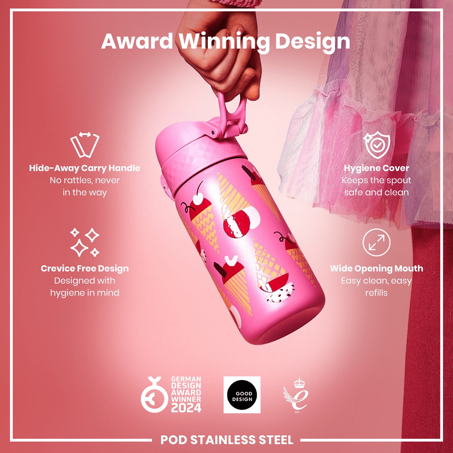 A pink, ice cream-patterned water bottle is held by a hand. Features include a hide-away handle, hygiene cover, and wide mouth. The bottle is an award-winning design.