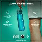 A teal water bottle stands upright against a white background. The bottle has a hinged, textured lid with a push-button closure. The brand 