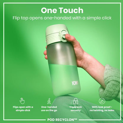 A light green water bottle is being held; its flip top is opened with one hand. The bottle is shown against a solid green background; text highlights its features: One Touch, flips open with a simple click, one-handed use, triple lock security, 100% leak proof. POD RECYCLON™ is also shown.