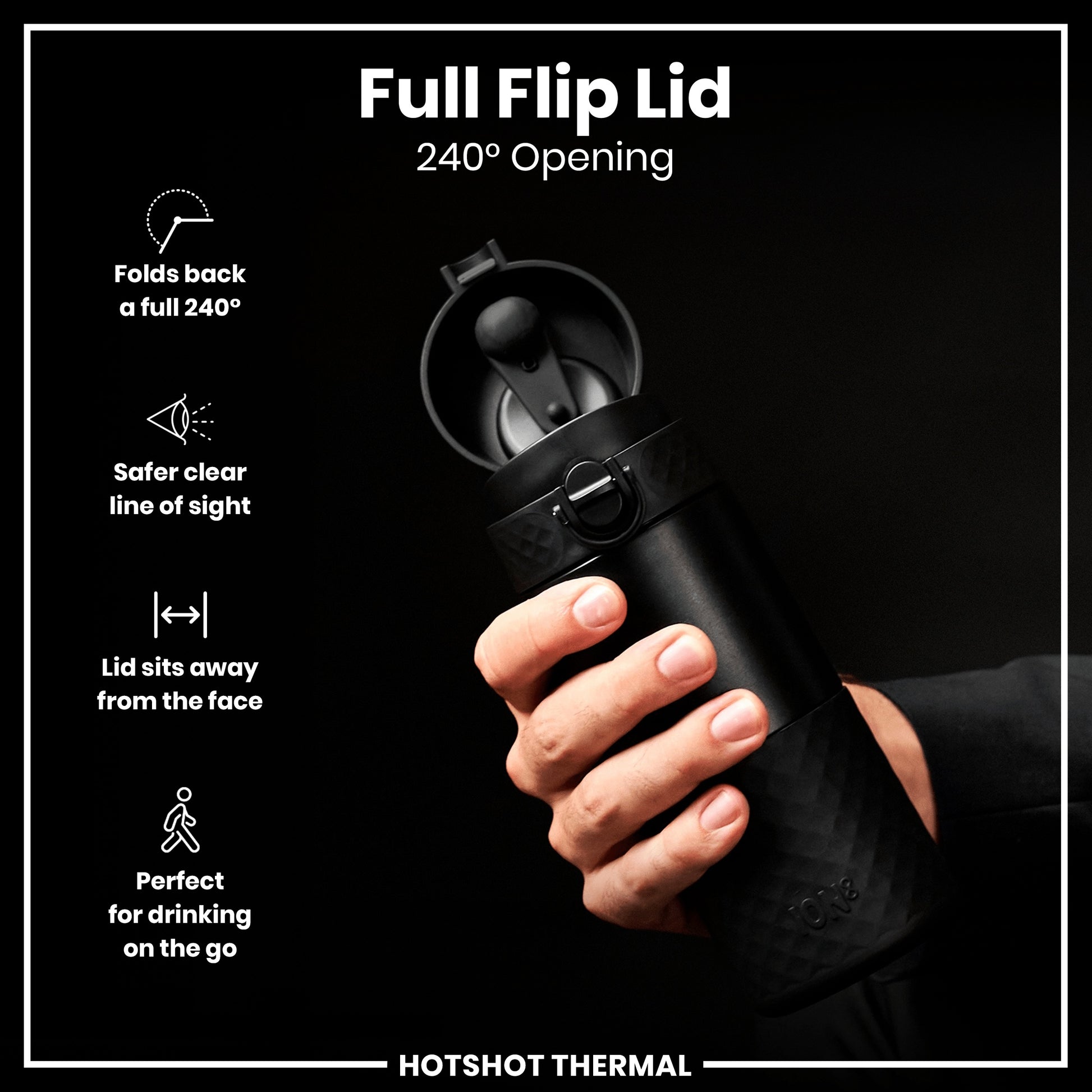 A black thermos; being held; against a black background. Full Flip Lid 240° Opening. HOTSHOT THERMAL.