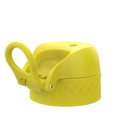 Yellow bottle lid with a flip-open spout and carrying loop resting against a white background.