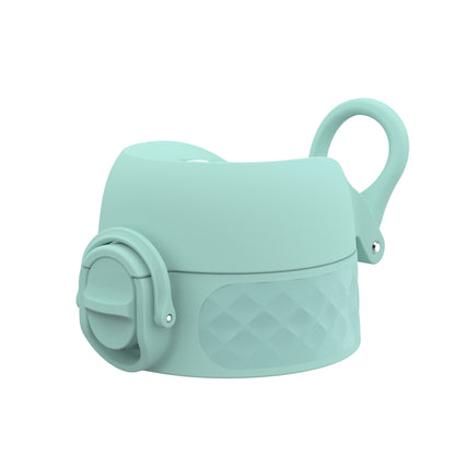 A teal silicone bottle lid with a loop handle and a secure latch sits against a plain white background featuring a textured grip area.