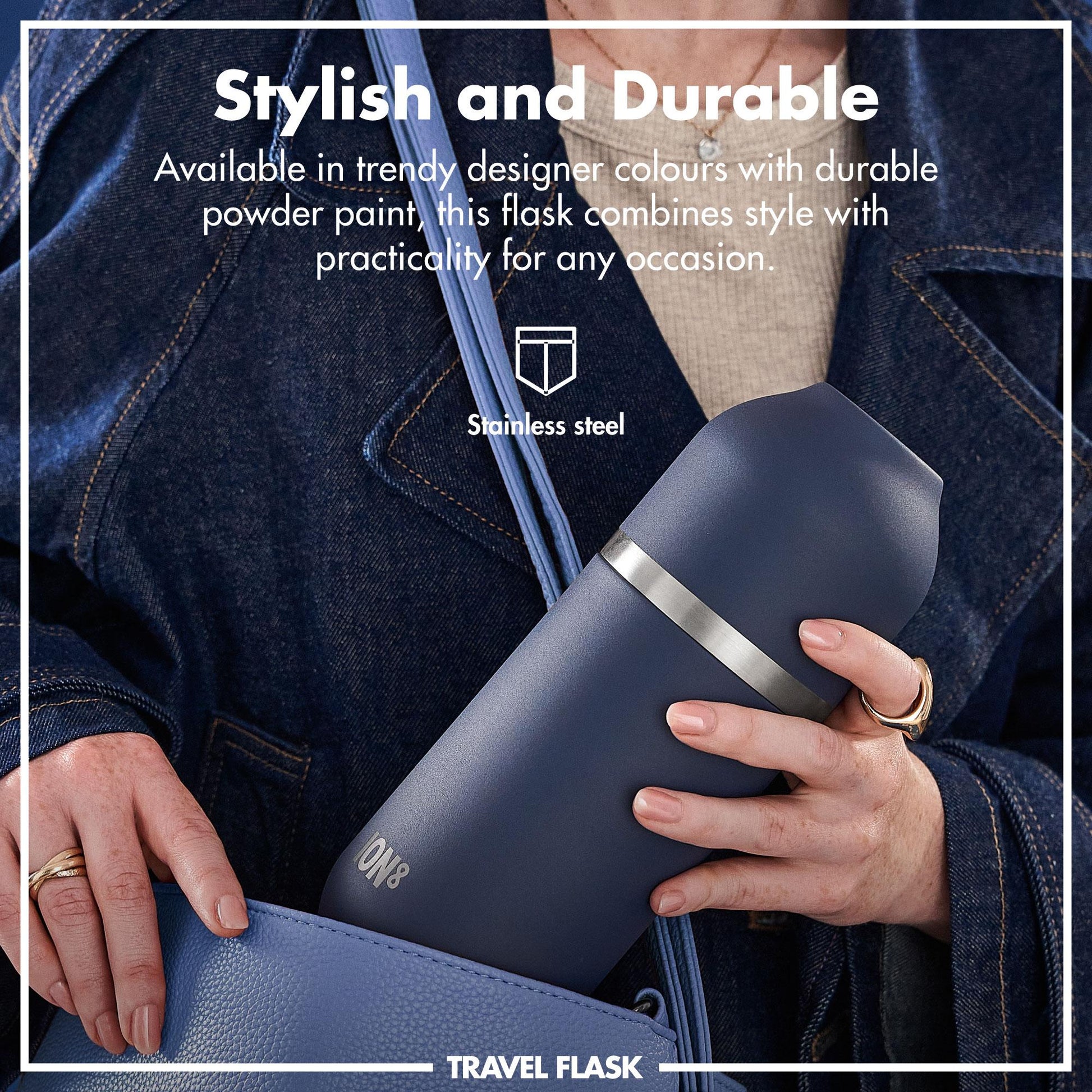 A person holds a blue travel flask with a silver band in a denim jacket pocket. Text reads: "Stylish and Durable Available in trendy designer colours with durable powder paint this flask combines style with practicality for any occasion Stainless steel TRAVEL FLASK."